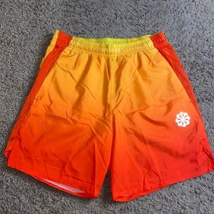 Mens orange nike running shorts